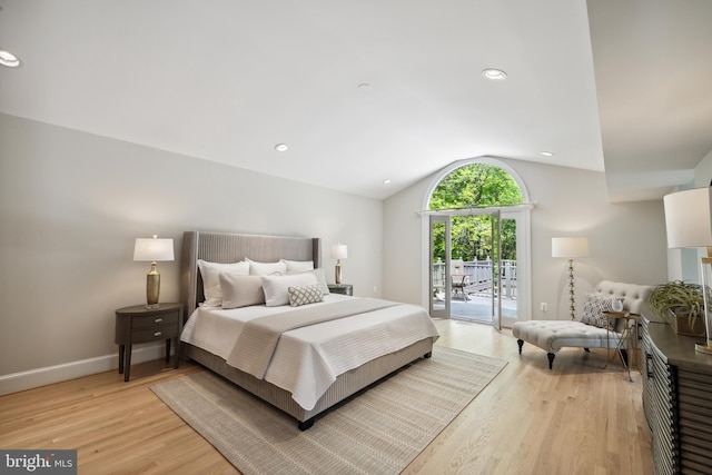 6530 Heather Brook Ct, Mclean, VA 22101 - bedroom featuring light wood-style floors, baseboards, vaulted ceiling, and access to exterior