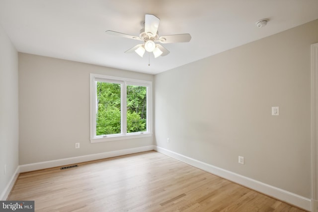 6530 Heather Brook Ct, Mclean, VA 22101 - unfurnished room with baseboards, a ceiling fan, wood finished floors, and visible vents