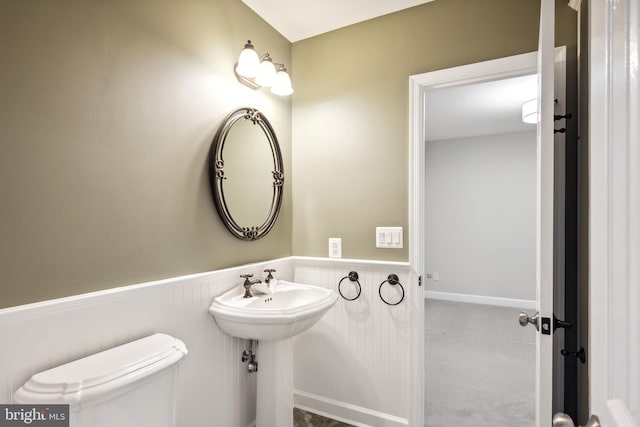 6530 Heather Brook Ct, Mclean, VA 22101 - bathroom with wainscoting and toilet