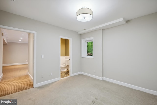6530 Heather Brook Ct, Mclean, VA 22101 - unfurnished bedroom with baseboards, light carpet, and ensuite bathroom
