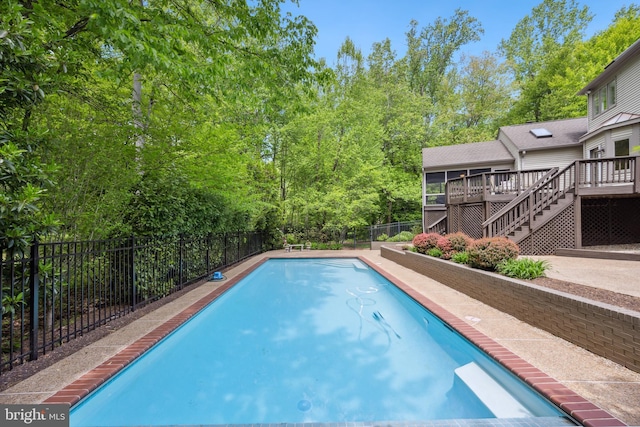 6530 Heather Brook Ct, Mclean, VA 22101 - view of swimming pool featuring stairs, a fenced backyard, a deck, and a fenced in pool