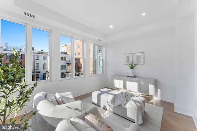 bedroom featuring recessed lighting, baseboards, visible vents, and wood finished floors