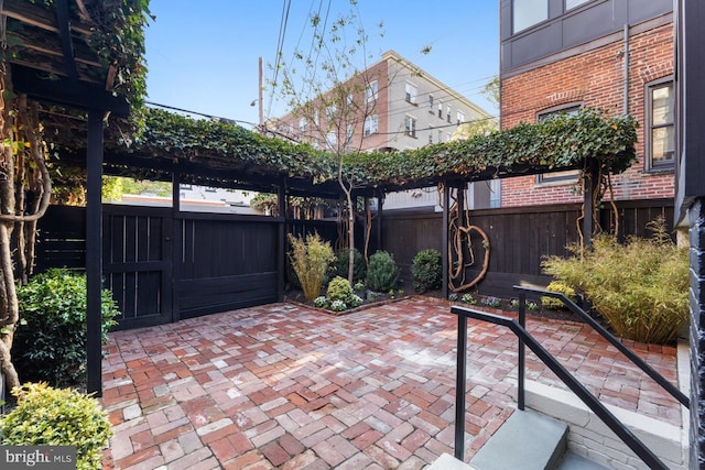 view of patio with fence