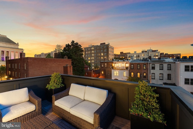 balcony featuring an outdoor hangout area and a city view