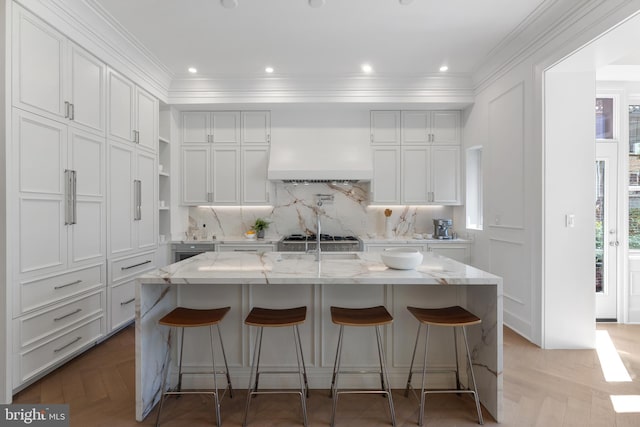kitchen with crown molding, white cabinets, and open shelves