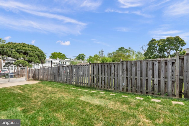 view of yard featuring a fenced backyard