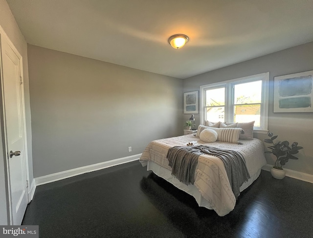 bedroom with baseboards