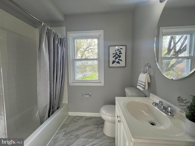 bathroom with vanity, marble finish floor, baseboards, toilet, and shower / bath combo with shower curtain
