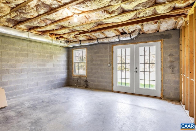 below grade area featuring plenty of natural light and french doors