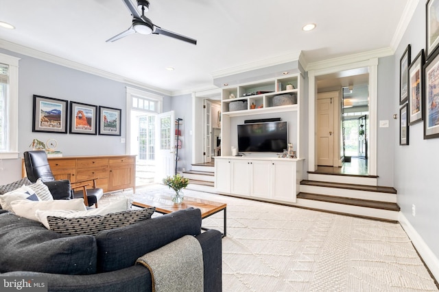 living area featuring crown molding, stairs, baseboards, recessed lighting, and a ceiling fan