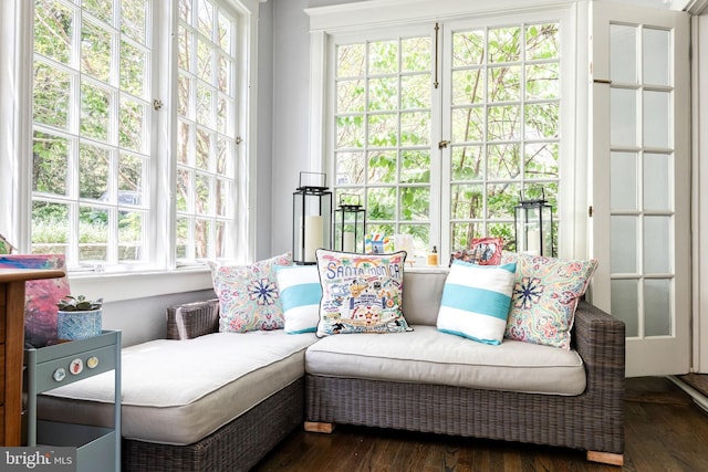 sunroom / solarium featuring french doors