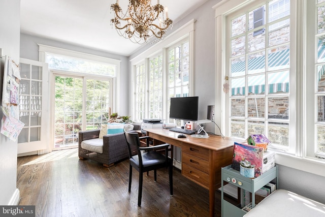 office with a chandelier, a wealth of natural light, and wood finished floors