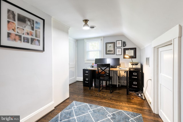office area featuring visible vents, baseboards, dark wood-style floors, and vaulted ceiling