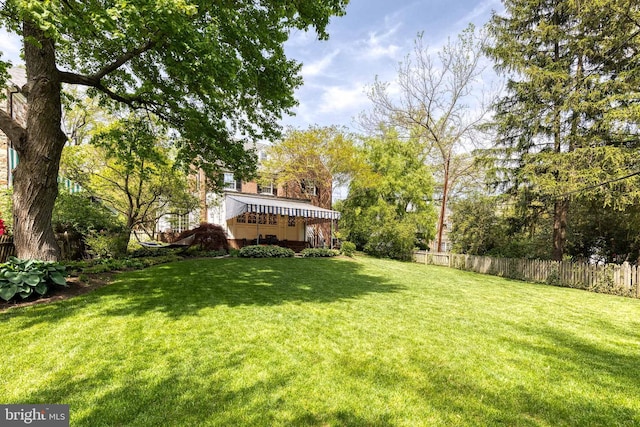 view of yard featuring fence