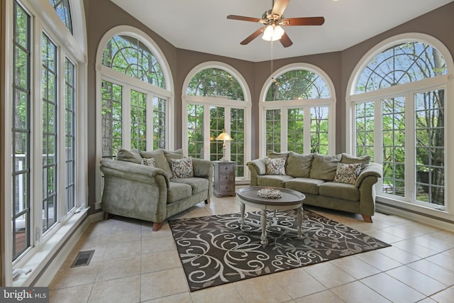 sunroom / solarium with plenty of natural light and french doors