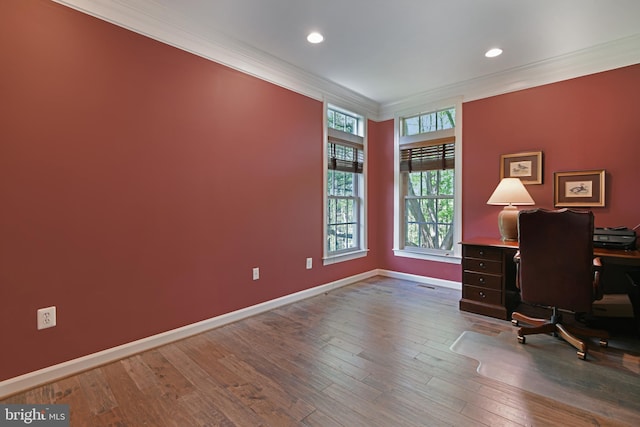 office area with baseboards, ornamental molding, recessed lighting, and wood finished floors