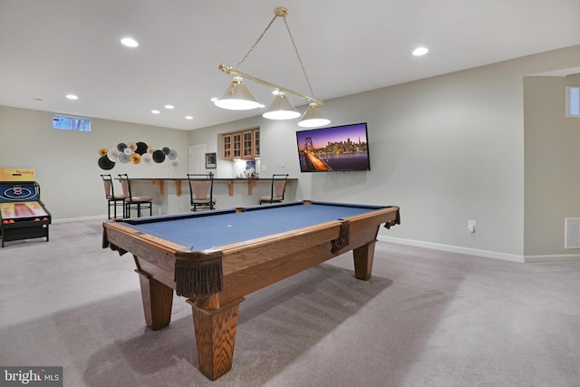 game room featuring carpet flooring, recessed lighting, baseboards, and bar area