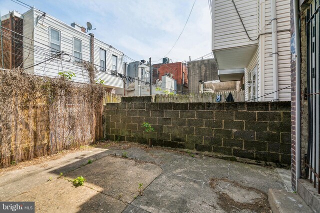 view of patio with fence