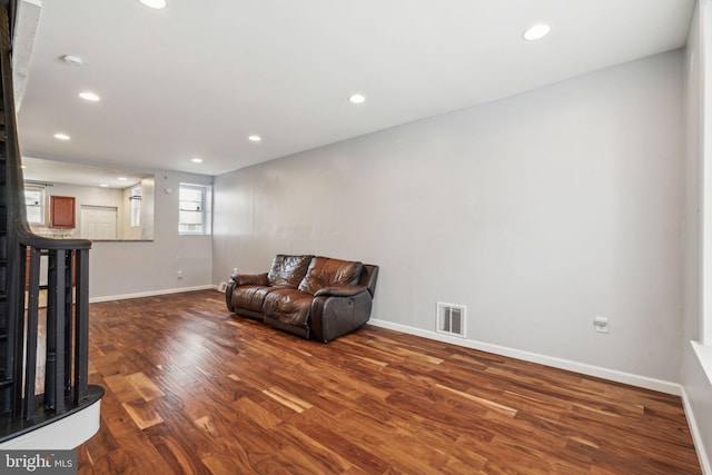 sitting room with visible vents, wood finished floors, and recessed lighting