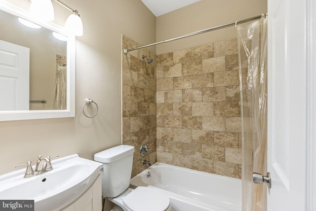 full bath featuring vanity, shower / bathtub combination with curtain, and toilet