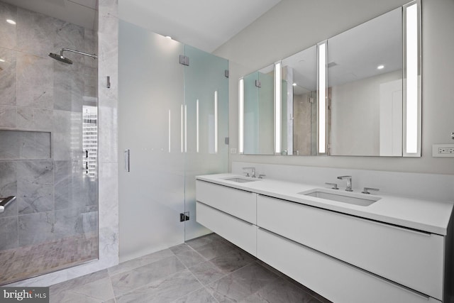 301 S Broad St Unit 1901-2, Philadelphia, PA 19107 - full bathroom featuring marble finish floor, a sink, double vanity, and a stall shower