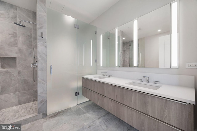 301 S Broad St Unit 1901-2, Philadelphia, PA 19107 - full bath featuring marble finish floor, a sink, a shower stall, and double vanity