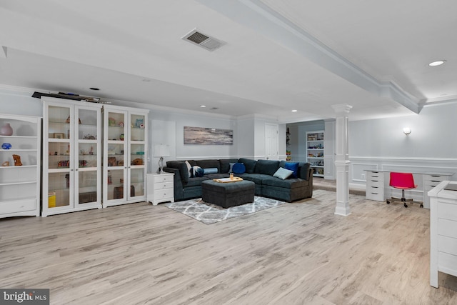 living area featuring wood finished floors, visible vents, recessed lighting, and ornamental molding