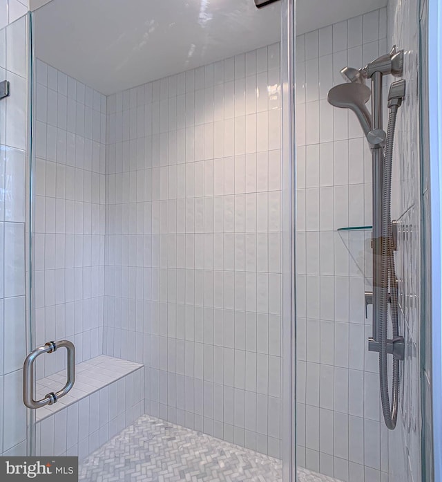 bathroom with a stall shower