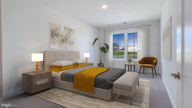 bedroom with baseboards, carpet floors, and visible vents
