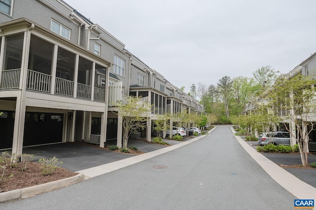 view of road with a residential view
