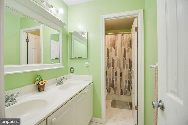 full bathroom featuring a sink, tile patterned floors, double vanity, and a shower with shower curtain