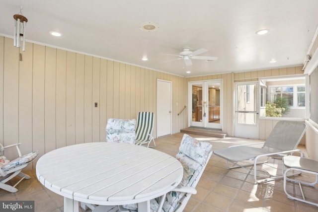 sunroom featuring french doors