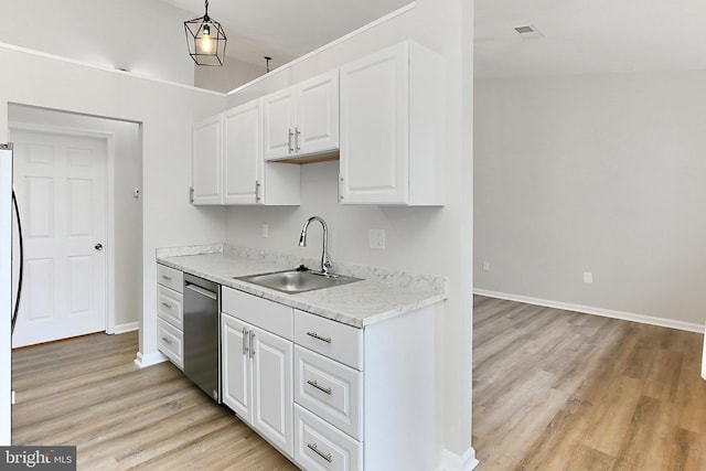 9552 Cannoneer Ct Unit 403, Manassas, VA 20110 - kitchen with stainless steel dishwasher, a sink, light wood-style floors, and white cabinets