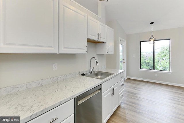9552 Cannoneer Ct Unit 403, Manassas, VA 20110 - kitchen featuring stainless steel dishwasher, a sink, light wood-style flooring, white cabinets, and vaulted ceiling