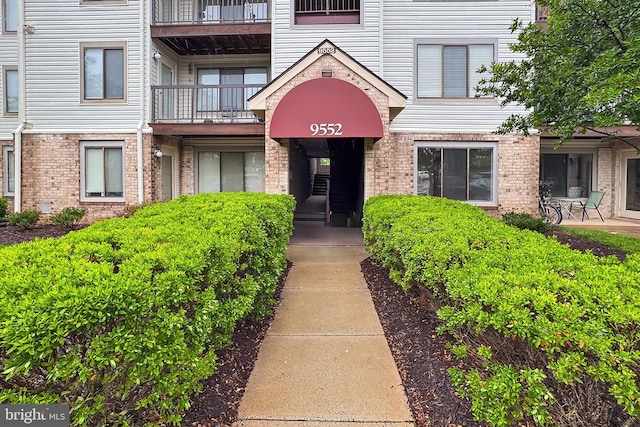 9552 Cannoneer Ct Unit 403, Manassas, VA 20110 - view of exterior entry with brick siding