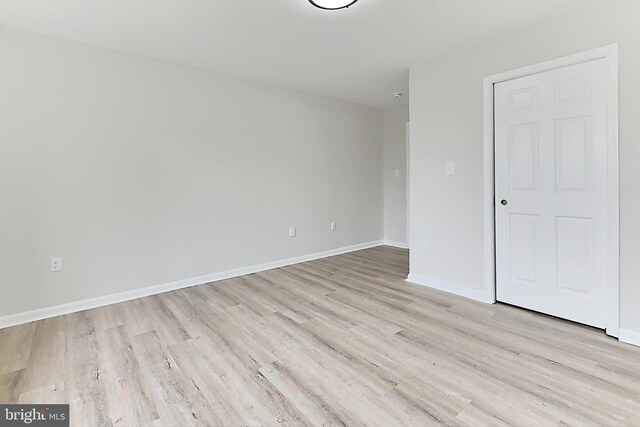 9552 Cannoneer Ct Unit 403, Manassas, VA 20110 - unfurnished bedroom with light wood-type flooring and baseboards
