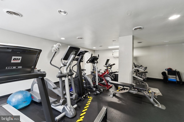 gym with recessed lighting and visible vents