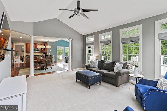 11373 Bishops Gate Ln, Laurel, MD 20723 - living room featuring decorative columns, a ceiling fan, and high vaulted ceiling