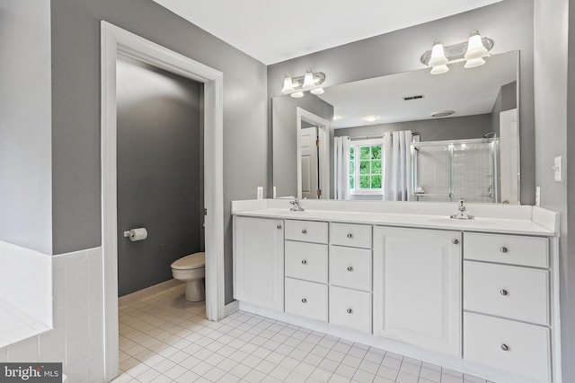 11373 Bishops Gate Ln, Laurel, MD 20723 - full bathroom with a stall shower, toilet, double vanity, and tile patterned floors