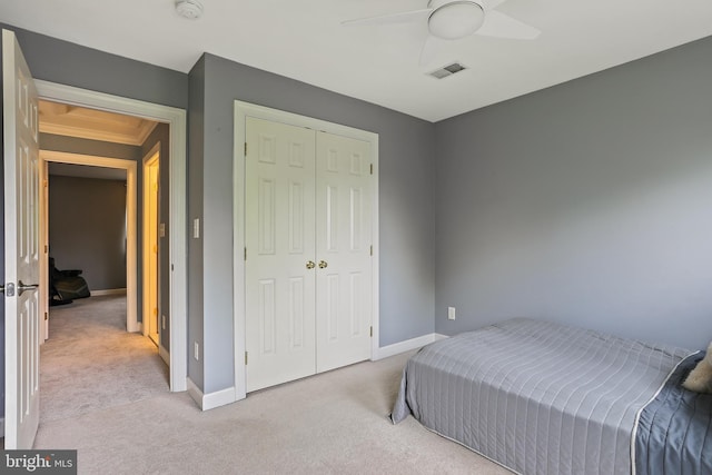 11373 Bishops Gate Ln, Laurel, MD 20723 - bedroom featuring light carpet, a closet, baseboards, and ceiling fan