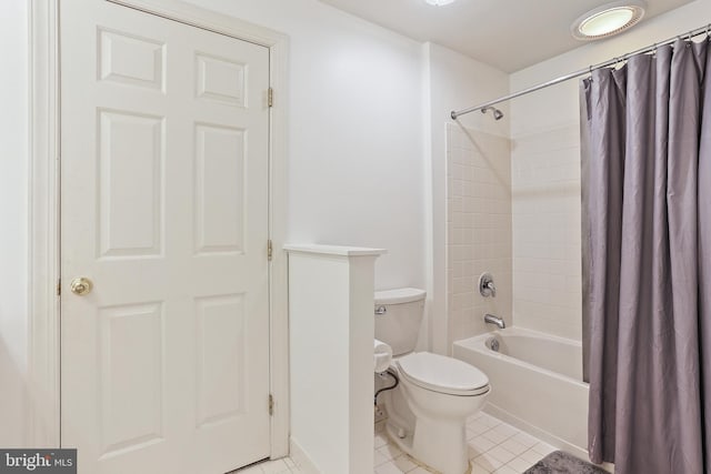 11373 Bishops Gate Ln, Laurel, MD 20723 - bathroom with tile patterned flooring, toilet, and shower / bath combo with shower curtain