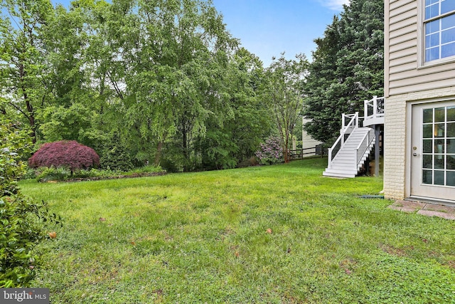 11373 Bishops Gate Ln, Laurel, MD 20723 - view of grassy yard featuring stairs and a deck