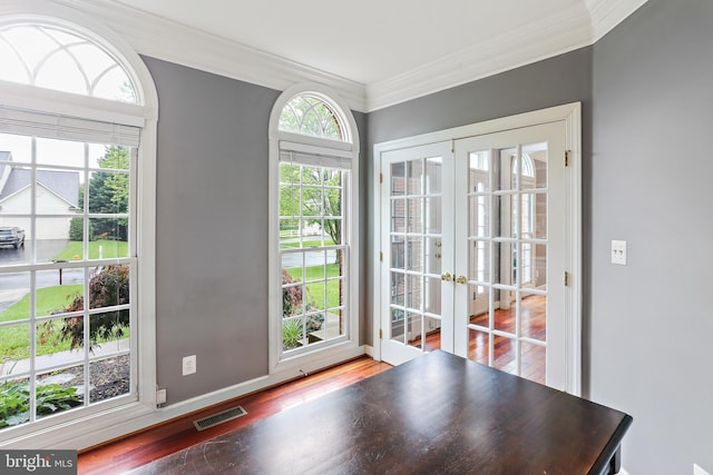 11373 Bishops Gate Ln, Laurel, MD 20723 - doorway to outside featuring wood finished floors, crown molding, french doors, and baseboards