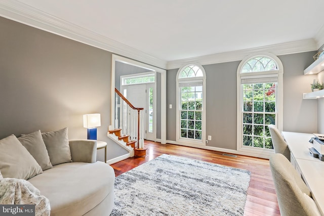 11373 Bishops Gate Ln, Laurel, MD 20723 - living room with crown molding, stairway, wood finished floors, and baseboards
