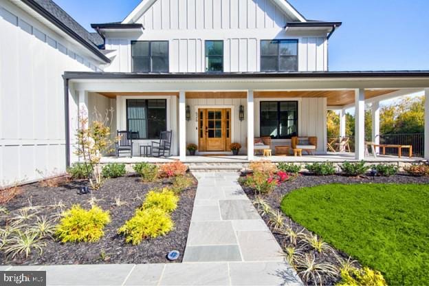 13 Sugarvale Way, Lutherville Timonium, MD 21093 - property entrance featuring board and batten siding and a porch