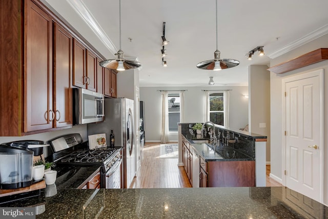 2331 Cambridge Walk, Baltimore, MD 21224 - kitchen with stainless steel appliances, a sink, light wood-type flooring, a ceiling fan, and ornamental molding