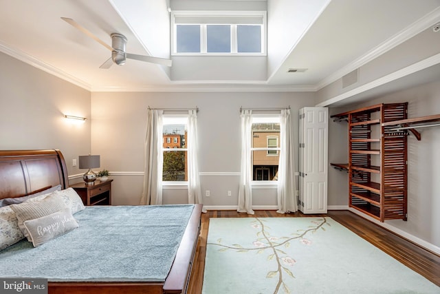 2331 Cambridge Walk, Baltimore, MD 21224 - bedroom featuring baseboards, crown molding, wood finished floors, and visible vents