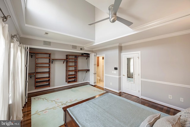 2331 Cambridge Walk, Baltimore, MD 21224 - bedroom featuring crown molding, wood finished floors, connected bathroom, baseboards, and visible vents
