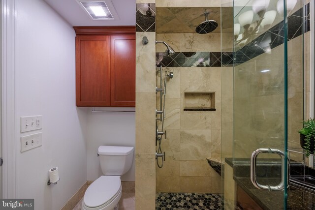 2331 Cambridge Walk, Baltimore, MD 21224 - bathroom featuring visible vents, toilet, and a stall shower