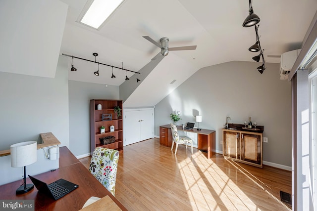 2331 Cambridge Walk, Baltimore, MD 21224 - interior space with a wall mounted AC, ceiling fan, light wood-style flooring, lofted ceiling, and visible vents